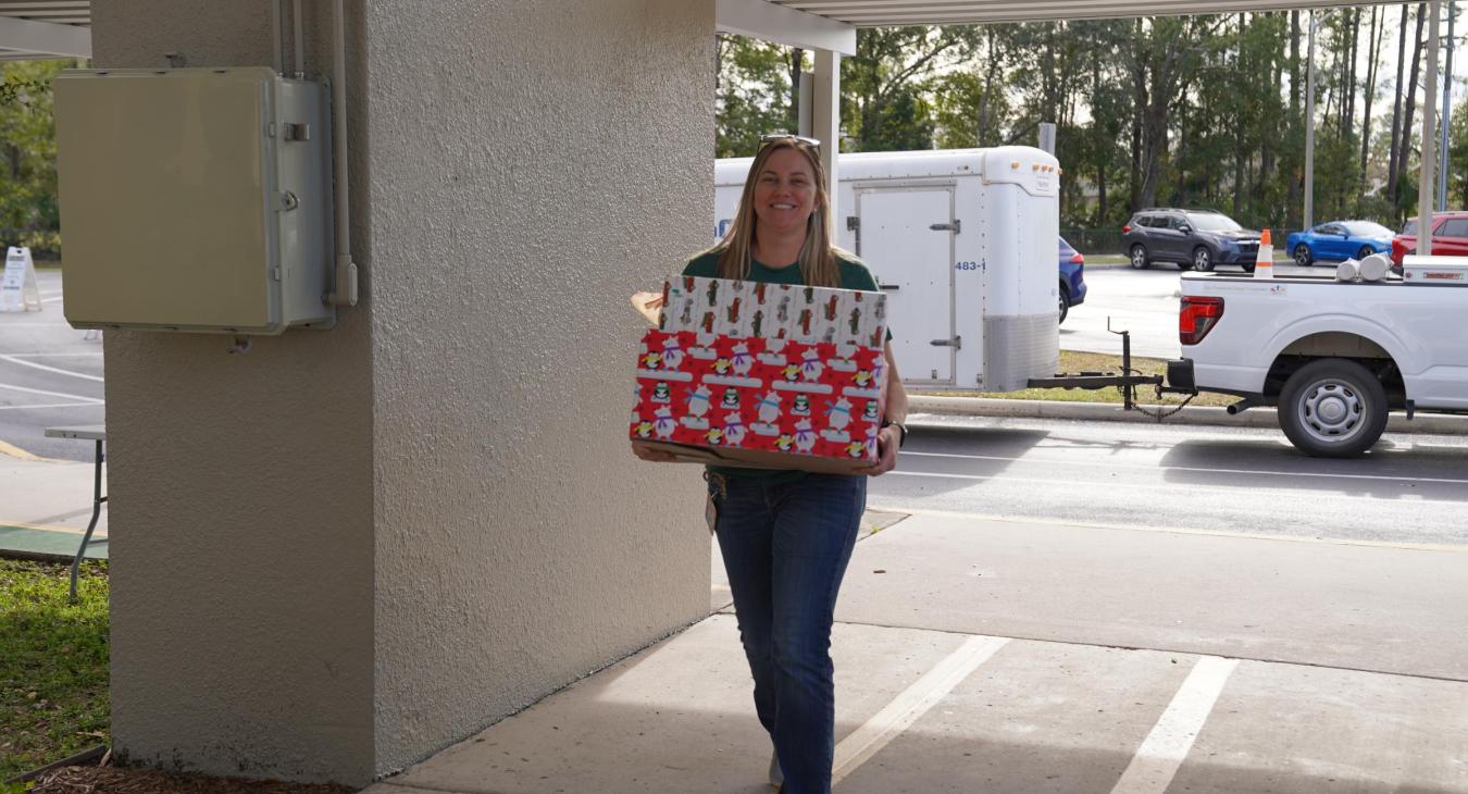 WREC Delivers Angel Tree Gifts to Quail Hollow Elementary School
