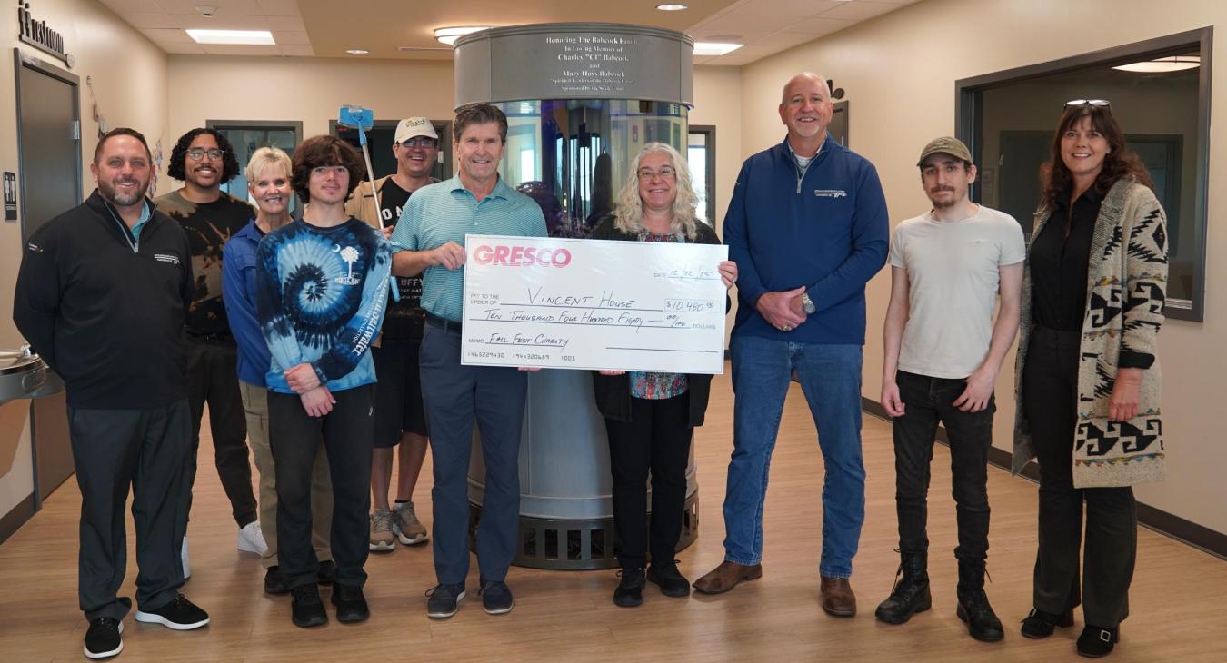 WREC Joins Gresco in Check Presentation at Vincent House