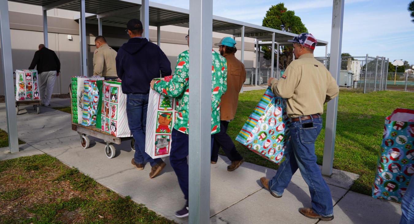 WREC's Bayonet Point employees deliver Angel Tree presents