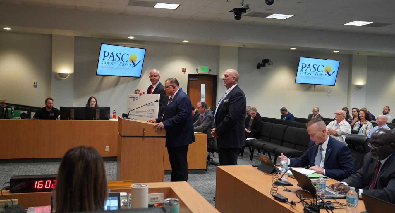 WREC Presents Pasco County Board of County Commissioners their Capital Credits check for $370,822.56
