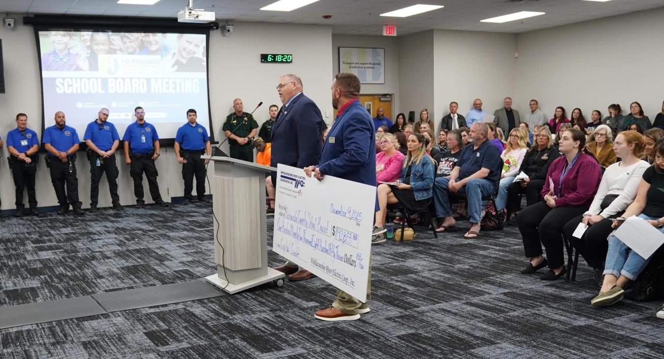 WREC Presents Hernando County School Board their Capital Credits check for $192,853.88