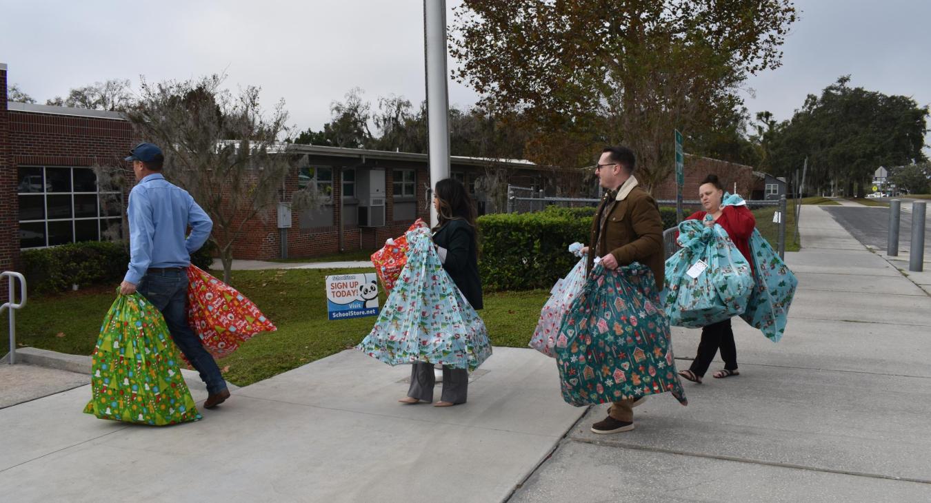 WREC Also Delivers Angel Tree Gifts to Pasco Elementary School