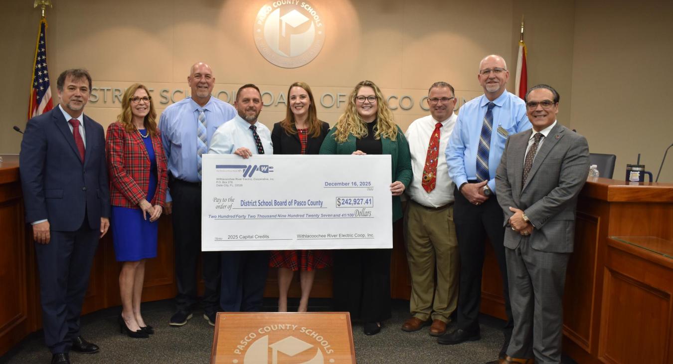 WREC Presents Pasco County School Board their Capital Credits check for $242,927.41