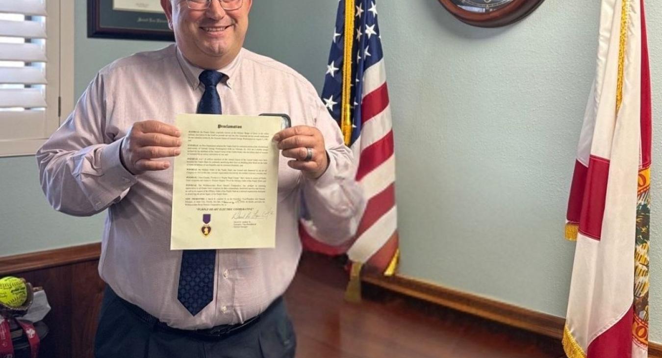 WREC's General Manager Signs Official Proclamation