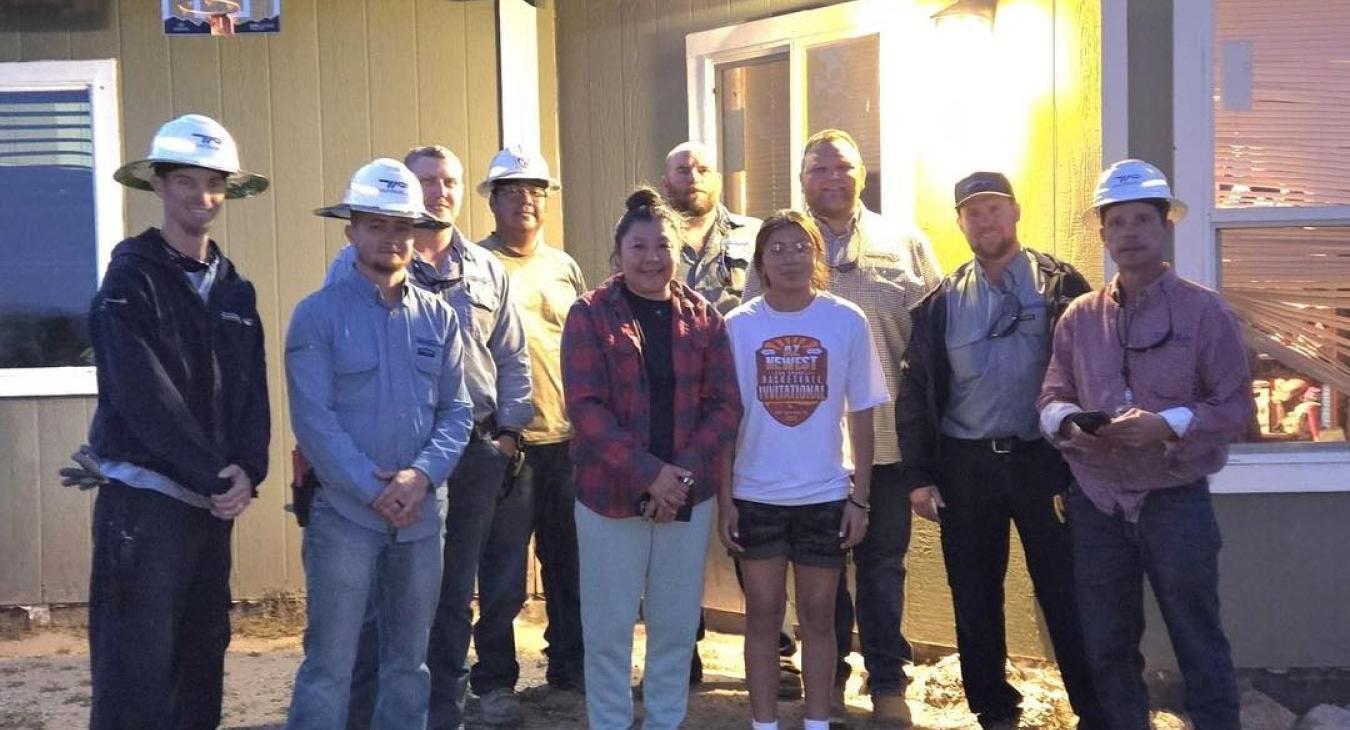 Two Navajo Families Receive Power on WREC's First Day of Light Up Navajo Project