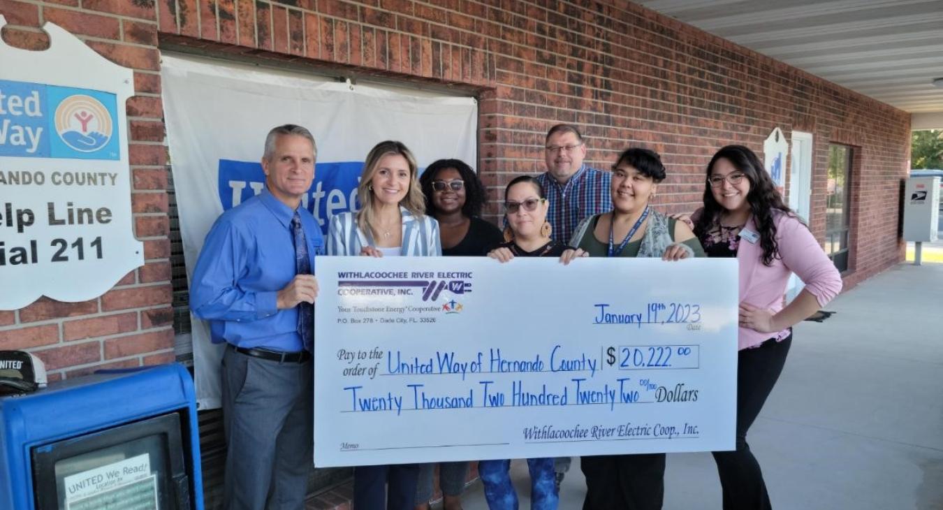 WREC presents United Way of Hernando County with a $20,222 donation check